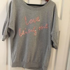 Love Being Me” short sleeve sweatshirt.